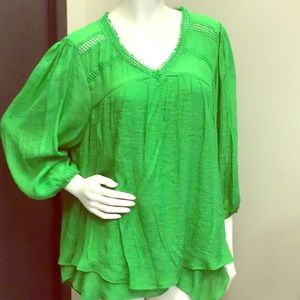 Green shirt, 60% rayon and 40% polyester